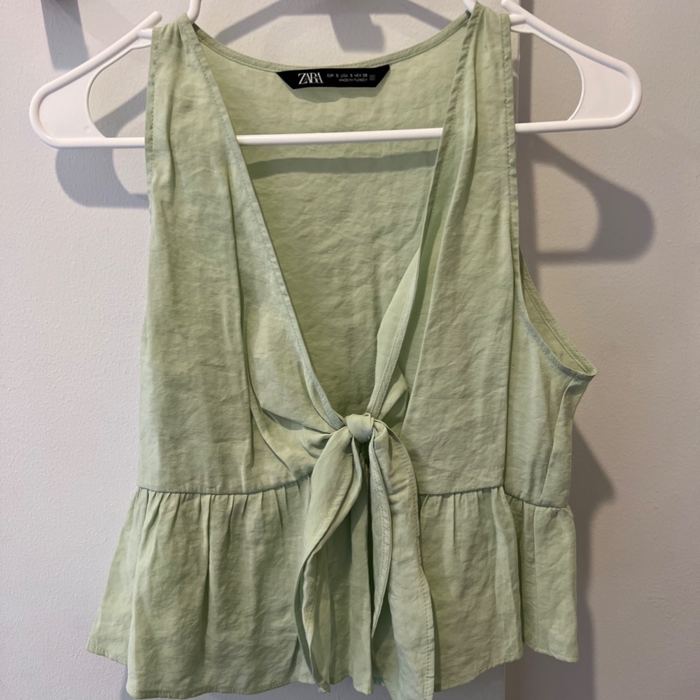 Green linen v-neck top with peplum